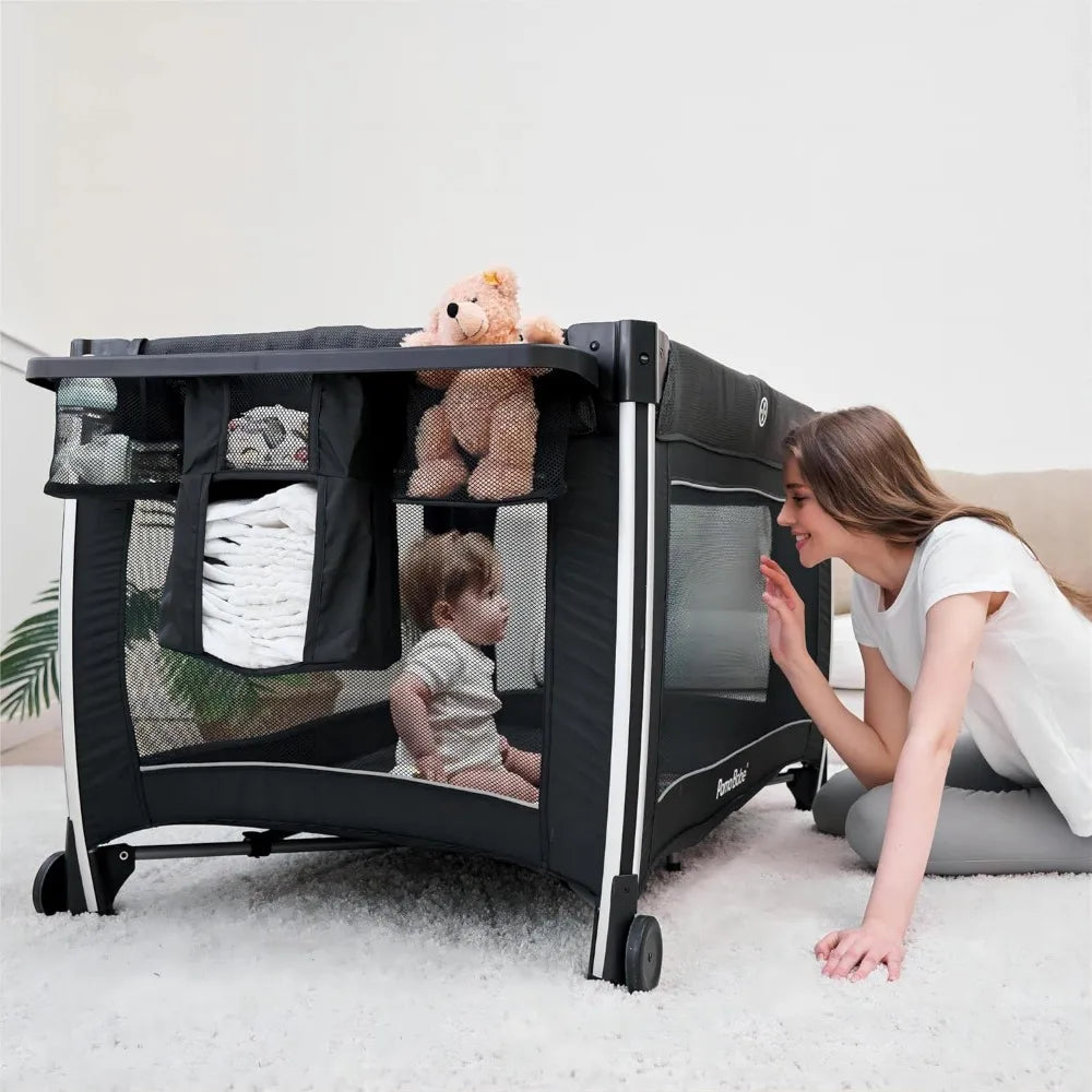 4-in-1 Deluxe Baby Crib & Playard – Foldable Travel Center with Bassinet, Mattress, and Changing Table